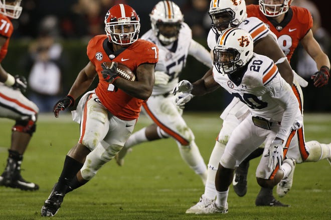 Georgia running back D'Andre Swift rushed for 186 yards and a 77-yard score in the Bulldogs' win Saturday over Auburn. [Photo/Joshua L. Jones, Athens Banner-Herald]