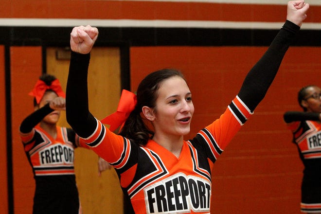 Bailey Cross of Freeport practices a cheer with her team Wednesday, Nov. 7, 2018, at Freeport Middle School in Freeport. Cross will perform with other cheerleaders from across the nation in the 99th annual Thanksgiving Day parade in Philadelphia, Pennsylvania. [JANE LETHLEAN/THE JOURNAL-STANDARD CORRESPONDENT]