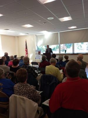 Pictured, from left: Norfolk County Register of Deeds William P. O’Donnell speaks to members of the Braintree AARP. [Courtesy Photo]