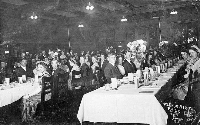 Philo members and their dates enjoy the 1911 Peanut Night, held in the banquet hall of the Colonial Hotel.