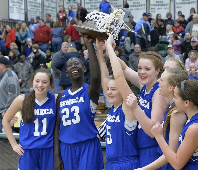Seneca's girls basketball players celebrated a District 10 Class 3A basketball championship over Northwestern at Mercyhurst University on March 3. [GREG WOHLFORD/ERIE TIMES-NEWS]