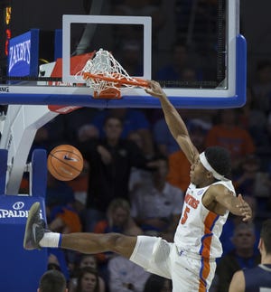 Florida guard KeVaughn Allen (5) could enter the Gators' all-time top 25 in scoring. [AP Photo/Ron Irby]