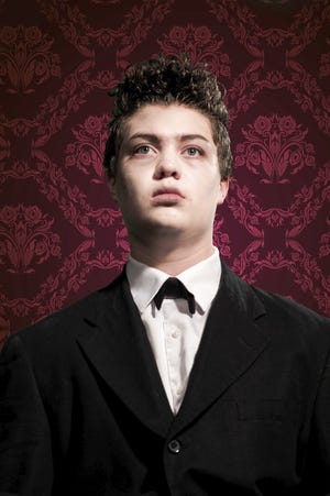 Aaron Shanor of Rochester plays Lurch in "The Addams Family" musical that opens Friday at the Lincoln Park Performing Arts Center in Midland. [Zachary Cageao]