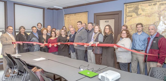 Pictured are chamber members along with Greater Mohawk Valley Land Bank representatives during a Nov. 8 ribbon-cutting event in Little Falls.      

[Photo Courtesy of Karl Gustafson]