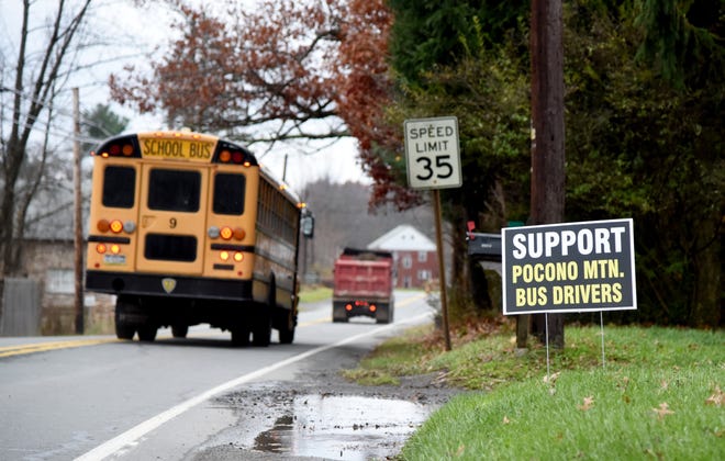 A sign showing support for the Pocono Mountain School District transportation staff sits on a lawn bordering Route 191 in Cresco on Tuesday, Nov. 13, 2018. The district's school board scheduled a public hearing on Nov. 14 to explore possibly outsourcing transportation needs to a third-party vendor. (PATRICK CAMPBELL/POCONO RECORD)