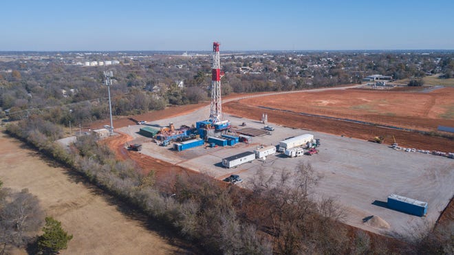 Drone shot of oil rig at SE 25 and High [Image by David Morris/The Oklahoman]