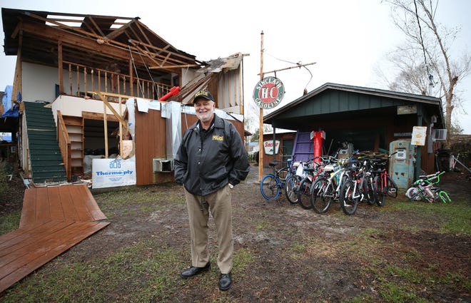 Mike Jones stands Wednesday in front of his Panama City home damaged by Hurricane Michael. [PATTI BLAKE/THE NEWS HERALD]