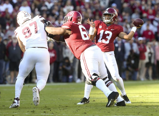 Alabama quarterback Tua Tagovailoa (13) throws a pass as offensive lineman Deonte Brown (65) blocks Mississippi State defensive tackle Lee Autry in Bryant-Denny Stadium on Saturday, Nov. 10, 2018. [Staff Photo/Gary Cosby Jr.]