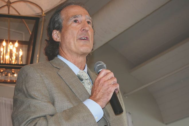 Scientist Craig C. Mello, recipient of the 2006 Nobel Prize in Medicine, speaks at an event in his honor hosted by the Portuguese American community on Nov. 10 at The Cove restaurant in Fall River.