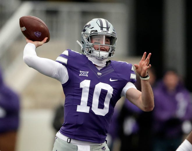 Kansas State quarterback Skylar Thompson (10) passes to a teammate during the first half of an NCAA college football game against Texas Tech in Manhattan, Kan., on Saturday. (AP Photo/Orlin Wagner)