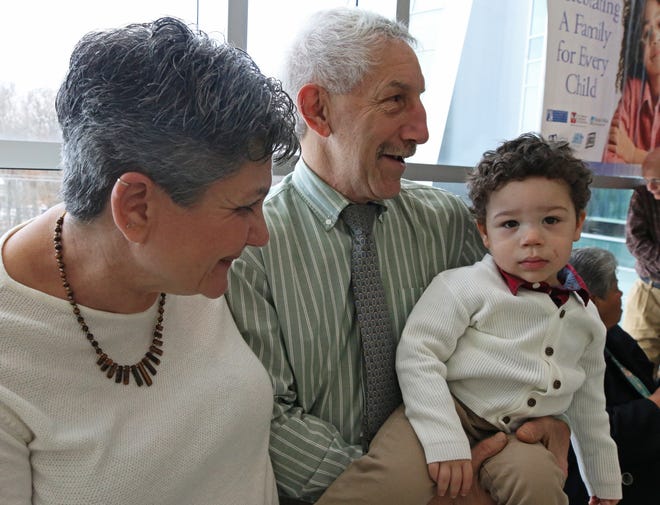 Margaret and Carl Gamba, of Richmond, formally adopted James Stephen Gamba, 2, at the Kent County Courthouse on Saturday. [The Providence Journal / Steve Szydlowski]