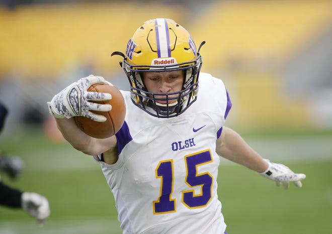 OLSH's Sig Saftner reaches for a touchdown during Saturday's WPIAL Class 1A Championship win against Rochester at Heinz Field in Pittsburgh. OLSH will begin its PIAA playoff run on either Nov. 30 or Dec. 1. [Sally Maxson/BCT staff]