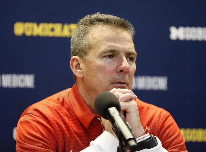 Ohio State coach Urban Meyer takes the high road when discussing Michigan. He prefers showing respect to the Wolverines and the rivalry game by working "so freakin' hard at it to do your very best." [Barbara J. Perenich]
