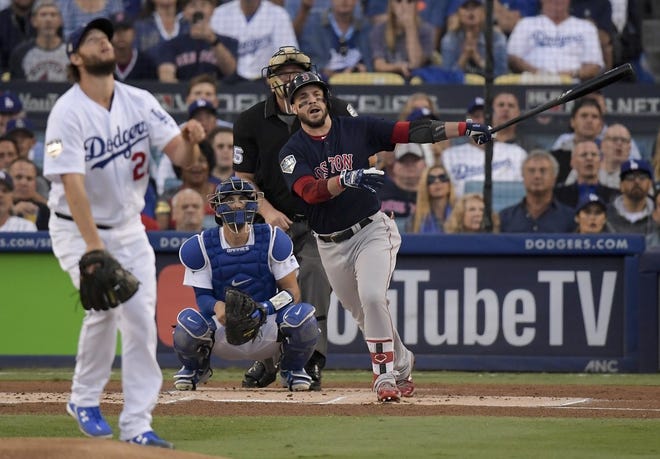 The Red Sox' Steve Pearce watches his two-run home run off Dodgers pitcher Clayton Kershaw during the first inning in Game 5 of the World Series. His one-year deal to return to Boston gives the organization time to develop several minor-league prospects.