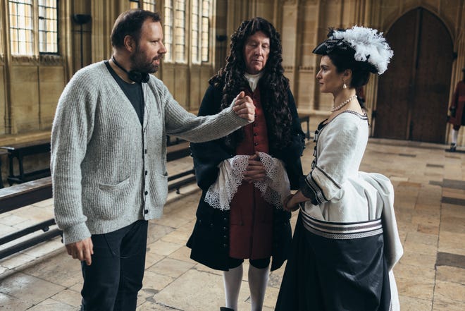 Yorgos Lanthimos discusses a scene with Rachel Weisz on the set of “The Favourite.” [Fox Searchlight]