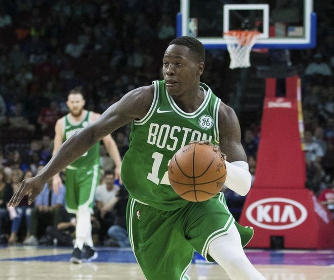 Despite trade request rumors, Celtics backup point guard Terry Rozier 
says some people 'think they're GMs,' and he's 'happy' in Boston.