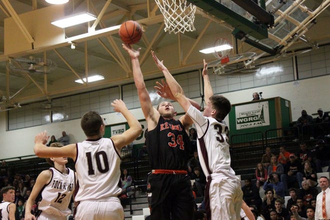 Kewanee's Carson Sauer (34) goes up for two of his 14 points during the Boilers' loss to Rockridge Tuesday.
