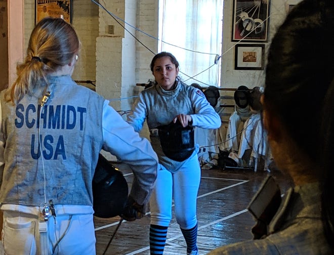 Sabrina Krupenko wins the senior women's foil event against Victoria Schmidt at the Harry Fulnick Open at the All-American Fencing Academy on Nov. 11, 2018. [Contributed photo]