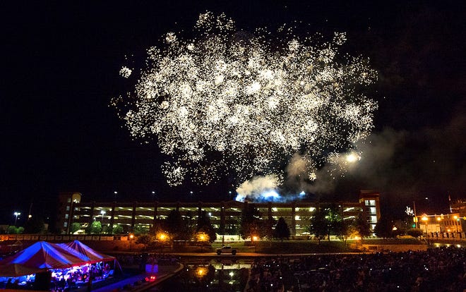 Fireworks explode over the Historic Arkansas Riverwalk on July 4, 2017, as hundreds gathered to listen to the Pueblo Symphony Orchestra and watch the holiday light show. [CHIEFTAIN PHOTO/FILE]