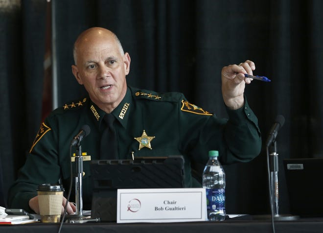 Marjory Stoneman Douglas High School Public Safety Commission chair and Pinellas County Sheriff Bob Gualtieri gestures as he speaks during a commission meeting in Sunrise, Fla., on June 7, 2018. (AP Photo/Wilfredo Lee, File)