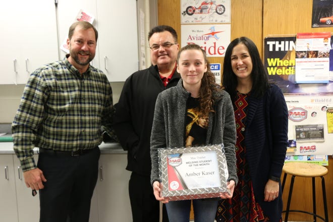 Amber Kaser was named the MAC Trailer Student of the Month for October. Amber is a Marlington High School student who takes part in the welding program at Alliance High School. She was presented with the award Nov. 14 by Gary Conny and Brooke Bandy from MAC Trailer.