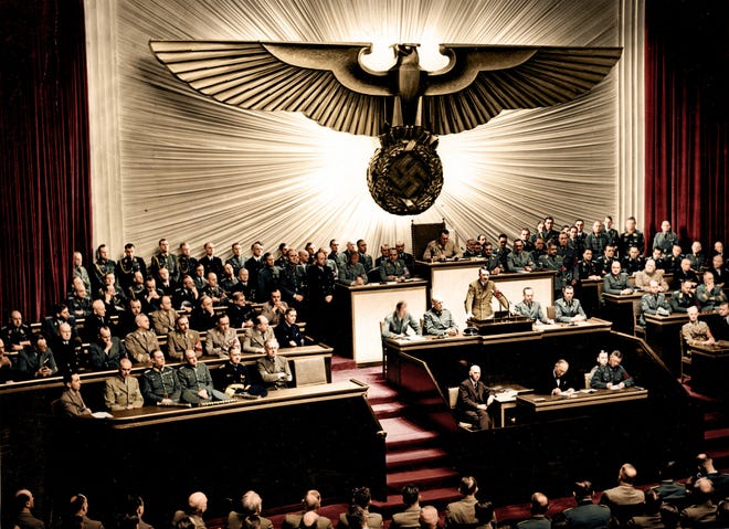 Adolf Hitler delivers a speech at the Kroll Opera House to the men of the Reichstag on the subject of Roosevelt and the war in the Pacific, declaring war on the United States. [ GERMAN FEDERAL ARCHIVES ]
