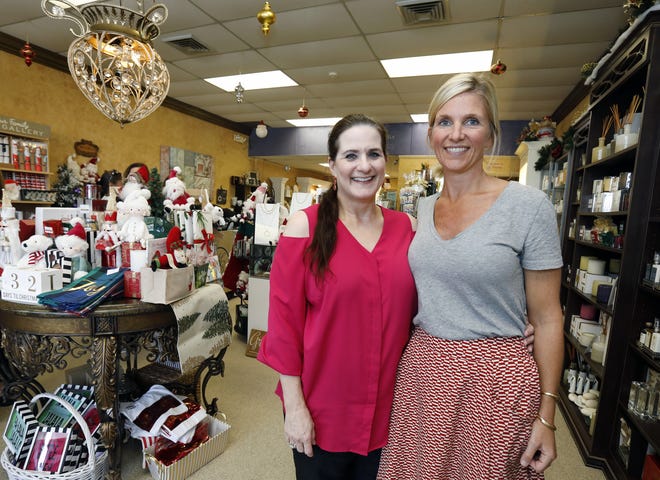 Owner Sherry Graffagnino, left and Catherine Wile are pictured at Molto Bella in Ormond Beach on Friday, Nov. 23, 2018. The boutique, just north of Granada Boulevard on North Nova Road, is among thousands of small businesses participating nationally in Small Business Saturday, an annual event launched in 2010 by credit card company American Express. [News-Journal/Nigel Cook]