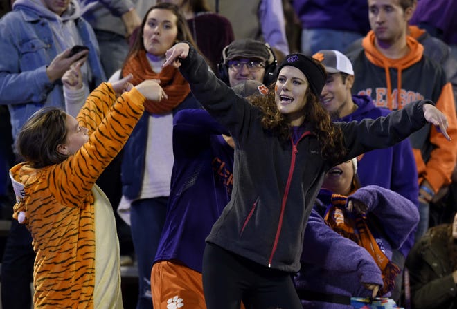 Winning is nice, but putting down a rival is equally fulfilling for college football fans. [AP File]