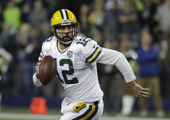Green Bay Packers quarterback Aaron Rodgers looks to pass against the Seattle Seahawks during the first half on Nov. 15, 2018, in Seattle. The Packers play the Minnesota Vikings on Sunday. [ELAINE THOMPSON/THE ASSOCIATED PRESS]