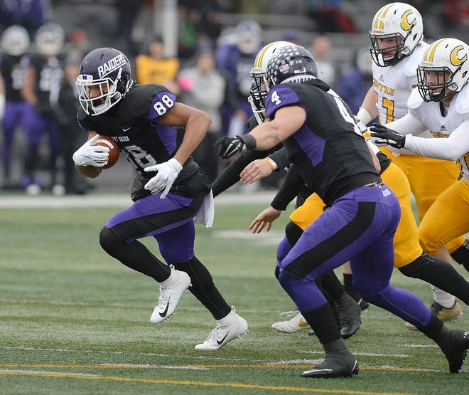 Mount Union's Edwin Reed returns a blocked punt against Centre College during the Division III playoffs Saturday, Nov. 24, 2018.
