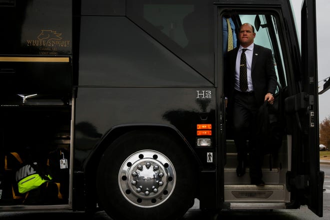 Missouri head coach Barry Odom exits the team bus before a game at Memorial Stadium on Friday. [Hunter Dyke/Tribune]