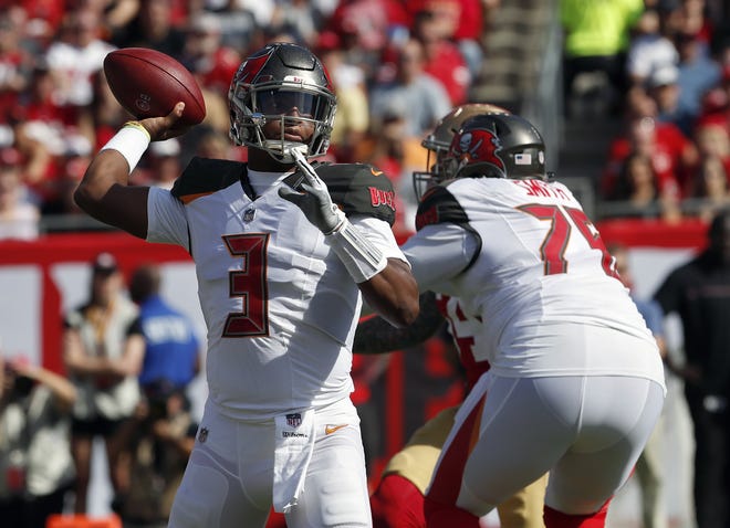 Tampa Bay Buccaneers quarterback Jameis Winston (3) throws a pass against the San Francisco 49ers during the first half of an NFL football game Sunday, Nov. 25, 2018, in Tampa, Fla. [Mark LoMoglio/AP Photo]