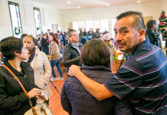 In this Dec. 13, 2017, photo Samuel Oliver-Bruno glances back before preparing for interviews after the press conference held at CityWell United Methodist Church in Durham, N.C. Oliver-Rruno, who sought refuge from deportation at the church for 11 months was arrested Friday after arriving at an appointment with immigration officials. (Casey Toth/The Charlotte Observer via AP)