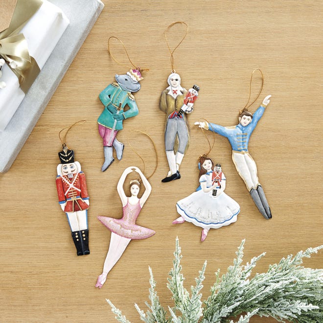 This undated photo shows Ballard Designs' Nutcracker collection of ornaments. Each handmade, handpainted 3D ornament features a character from the iconic holiday play. (Ballard Designs via AP)