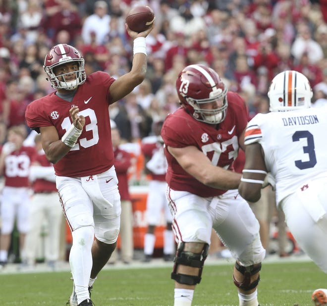 Alabama quarterback Tua Tagovailoa (13) was 25 of 32 for 324 yards with five touchdowns on Saturday. He was 11 of 12 passing in the second half.