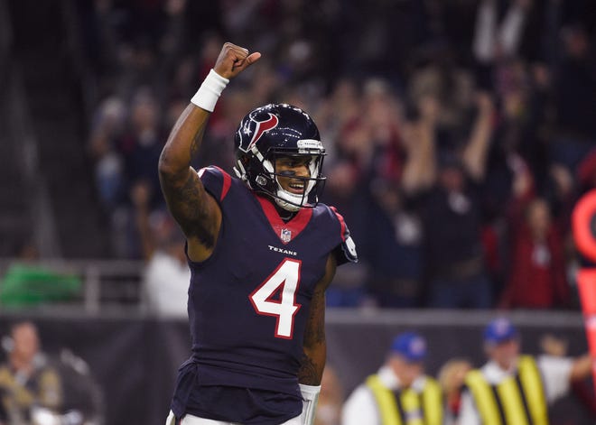 Houston Texans quarterback Deshaun Watson (4) celebrates after connecting with wide receiver Demaryius Thomas for a touchdown against the Tennessee Titans Monday night. [AP Photo/Eric Christian Smith]
