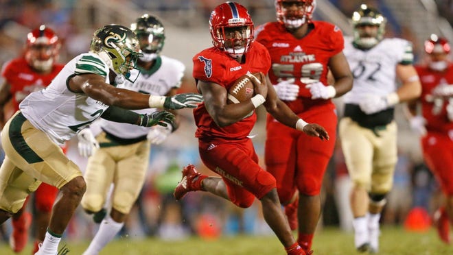 Florida Atlantic running back Devin Singletary (5) said after Saturday's loss he will think about jumping to the NFL. [JOEL AUERBACH/Getty Images]