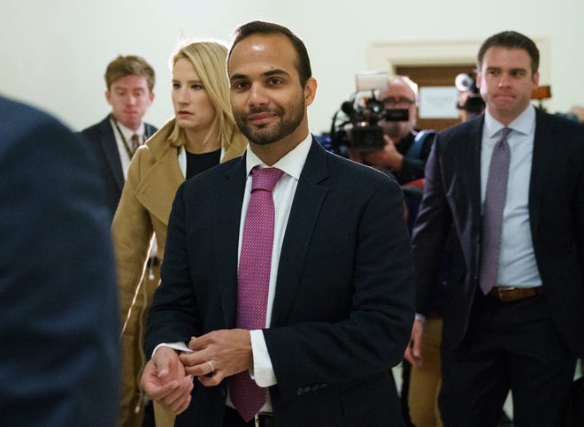 FILE - In this Oct. 25, 2018, file photo, George Papadopoulos, the former Trump campaign adviser who triggered the Russia investigation, arrives for his first appearance before congressional investigators, on Capitol Hill in Washington. A judge has rejected an effort by former Trump campaign foreign policy adviser Papadopoulos to delay his two-week prison term and says Papadopoulos must surrender Monday, Nov. 26, as scheduled. (AP Photo/Carolyn Kaster, File)