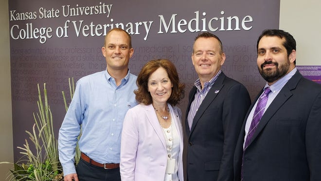 Bonnie Rush, second from left, interim dean of the College of Veterinary Medicine at Kansas State University, meets with, from left, Jesper Nordengaard, Jolle Kirpensteijn and Omar Farias from Hill's Pet Nutrition about Hill's lead gift supporting the creation of a new Pet Health & Nutrition Center at the university's Veterinary Health Center. [K-State]