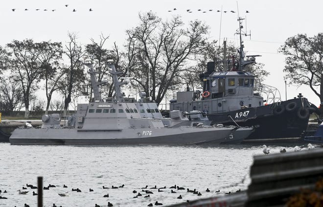 Three Ukrainian ships are docked after been seized ate Sunday, Nov. 25, 2018, in Kerch, Crimea, Monday, Nov. 26, 2018. (AP Photo)