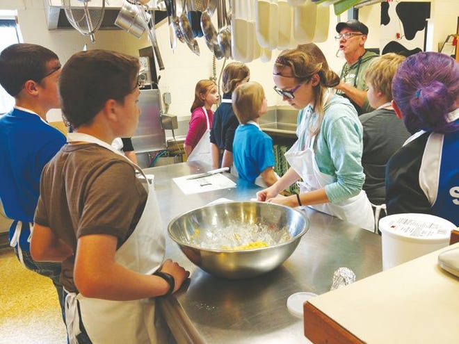 Students in the Young Chefs program at Wolverine Community Schools learn how to prepare meals from scratch.