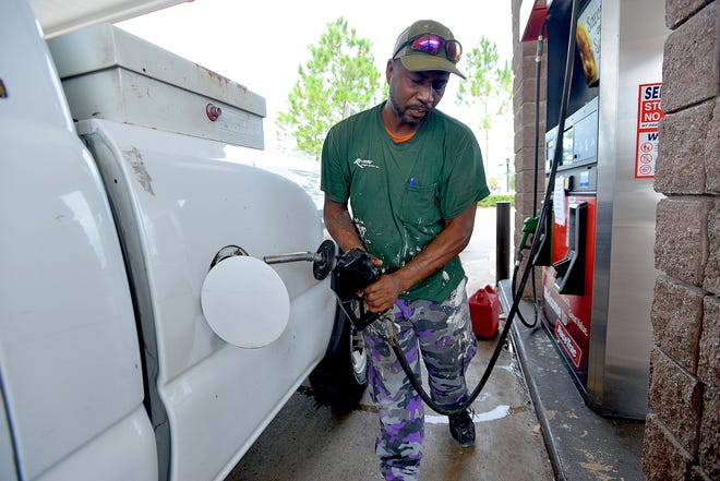 Darrell Robinson fills up his gas tank at RaceTrac on Oct. 6, 2016 in Leesburg. [Daily Commercial File]