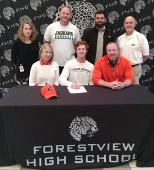 Forestview High School senior Jackson Harbin has signed a college baseball scholarship with Carson-Newman. Pictured (left to right) on front row are Traci Harbin (Mom), Jackson Harbin, Scott Harbin (Dad), back row Crystal Houser (Principal), Brian Horne (Head Baseball coach), Preston Lyon (Assistant Baseball coach), Alan Stewart (Athletic Director). [Special to The Gazette]