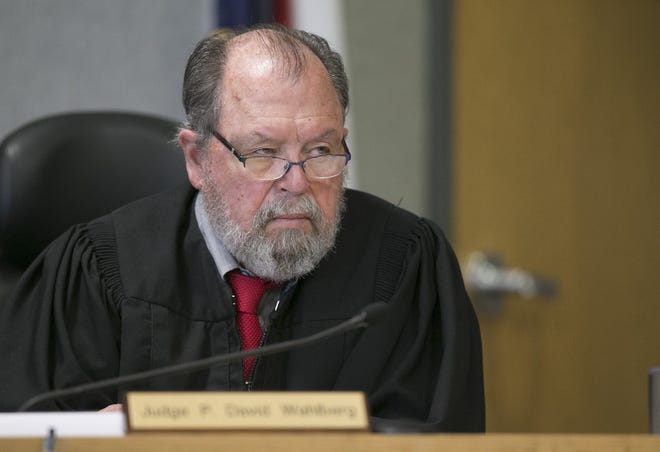 Judge David Wahlberg listens Monday during a sentencing hearing for Meagan Work at the Blackwell-Thurman Criminal Justice Center. On Wednesday, the judge appeared to become emotional during testimony from a witness who said he saw Work abuse her toddler son. [JAY JANNER/AMERICAN-STATESMAN]