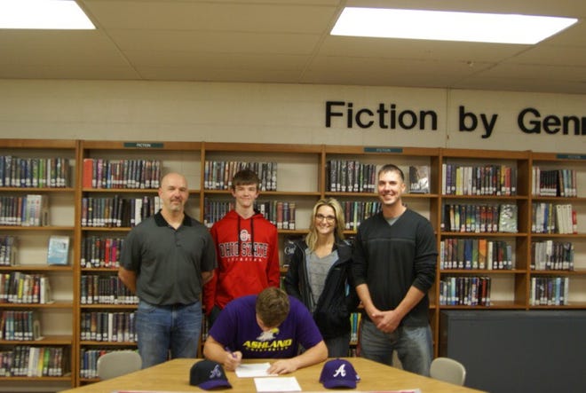 Loudonville senior catcher Mason Huffman (front) recently signed his letter of intent to play for the Ashland University baseball team. In attendance at his signing were his father, Pat (in back, from left), younger brother, Logan, mother, April, and Loudonville baseball coach Brandon Grimes.