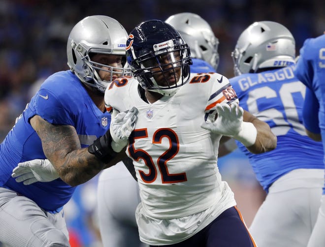 Chicago Bears outside linebacker Khalil Mack (52) rushes against the Detroit Lions during the first half of a NFL game in Detroit. [AP PHOTO/PAUL SANCYA]