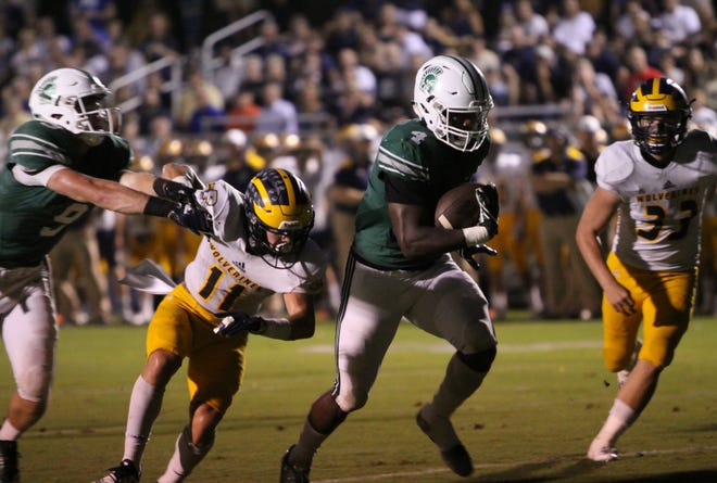 Athens Academy's Len'Neth Whitehead scores on a 9-yard run in the first quarter against Prince earlier this year. (File photo by Matthew Caldwell/mcaldwell@onlineathens.com)