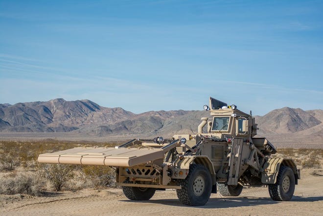 U.S. Army Reserve Soldiers from the 305th Engr. Co. (Route Clearance), Camp Pendleton, California train on the new Husky Mounted Detection System (HMDS), recently upgraded on their Husky MK III vehicles, Nov. 15, at Fort Irwin, California.