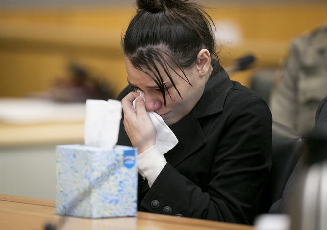 Meagan Work cries Friday at the Blackwell-Thurman Criminal Justice Center as she listens during her sentencing in connection with the death of her 2-year-old son, Colton Turner. [JAY JANNER/AMERICAN-STATESMAN]
