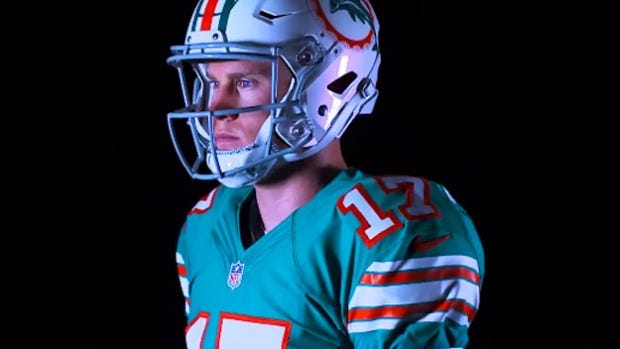 Ryan Tannehill, wearing a splendid Dolphins throwback outfit. [MIAMI DOLPHINS]